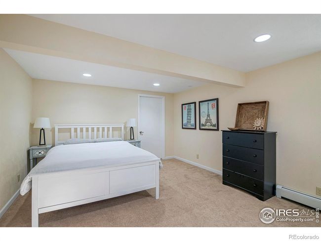 Bedroom 5 on lower level with egress window | Image 29