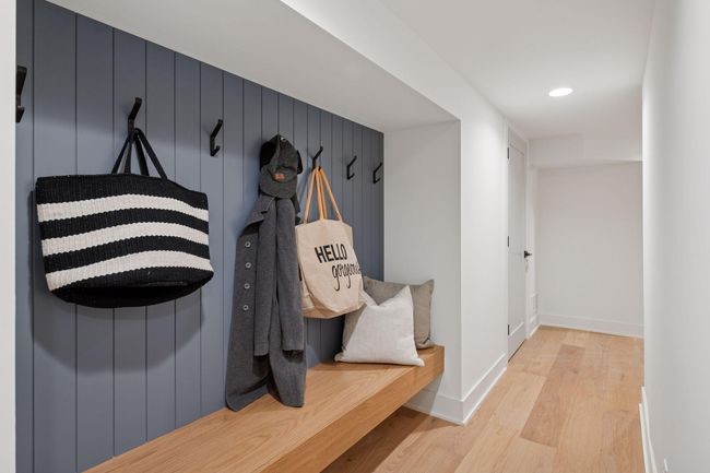 Built-in area off the garage is great for coats and shoes. Two additional closets for storage here as well. | Image 20