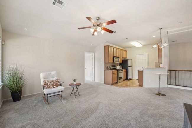 Split-Level Style – Upstairs living offers privacy and quiet away from the entry. | Image 15