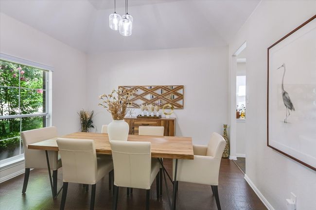 This perfect size dining area is just off the kitchen. | Image 13