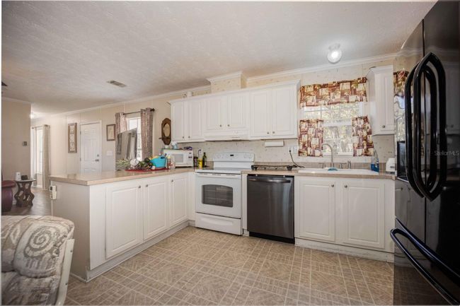 2763 County Road 503, House other with 3 bedrooms, 2 bathrooms and null parking in Wildwood FL | Image 9