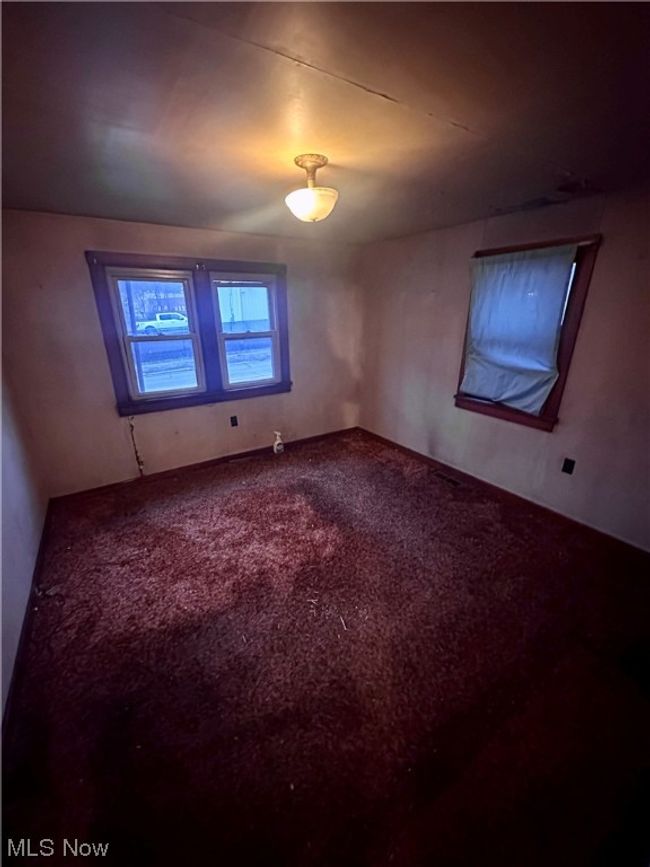 Spare room featuring carpet | Image 13