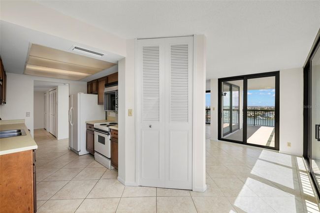 Kitchen with balcony entrance | Image 18