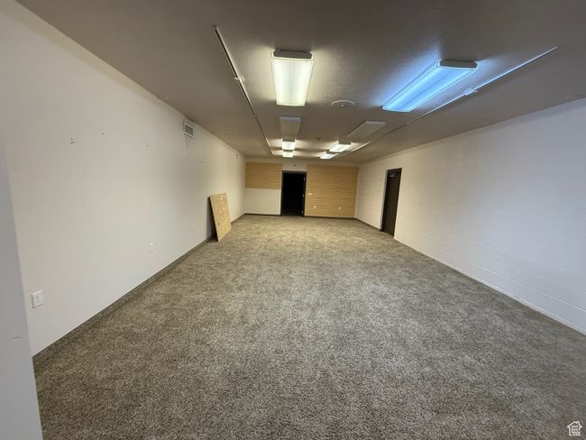 Unfurnished room with light carpet and visible vents | Image 18