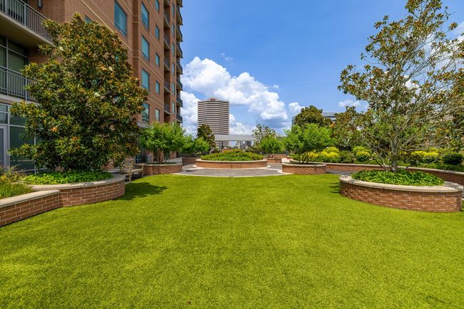 Lush, inviting outdoor space perfect for relaxation and leisure. | Image 27