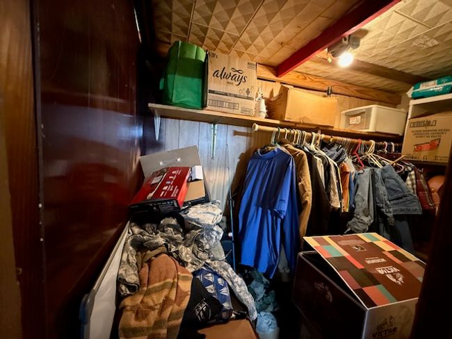 Walk in closet with beamed ceiling | Image 45