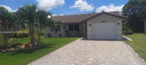 7008 Nw 95th Ter, Tamarac, FL, 33321-3049 | Card Image