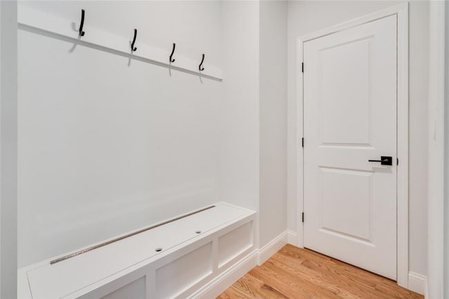 Unfurnished room with visible vents, baseboards, ceiling fan, light carpet, and a tray ceiling | Image 19