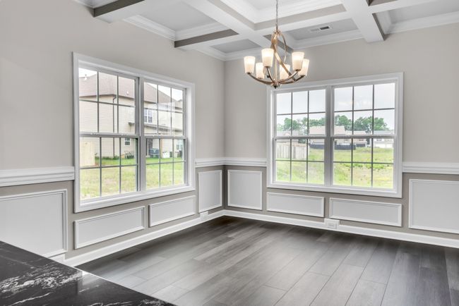EXAMPLE>>>Spacious Formal Dining Room with a Coffered Ceiling & Beautiful Wainscoting! | Image 8