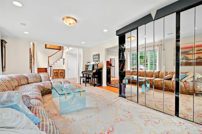 Living room featuring stairs, recessed lighting, ornamental molding, and wood finished floors | Image 8