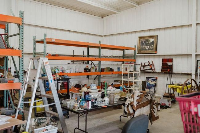 Garage with a workshop area | Image 19