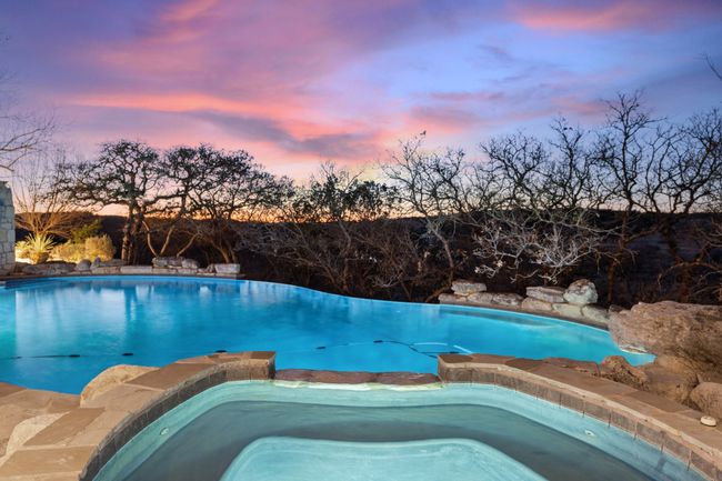 Pool at dusk with a pool with connected hot​​‌​​​​‌​​‌‌​‌‌​​​‌‌​​‌‌​‌​​​​​‌ tub | Image 22