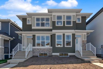 115 Aquila Dr Nw, Home with 3 bedrooms, 2 bathrooms and 2 parking in Calgary AB | Image 1