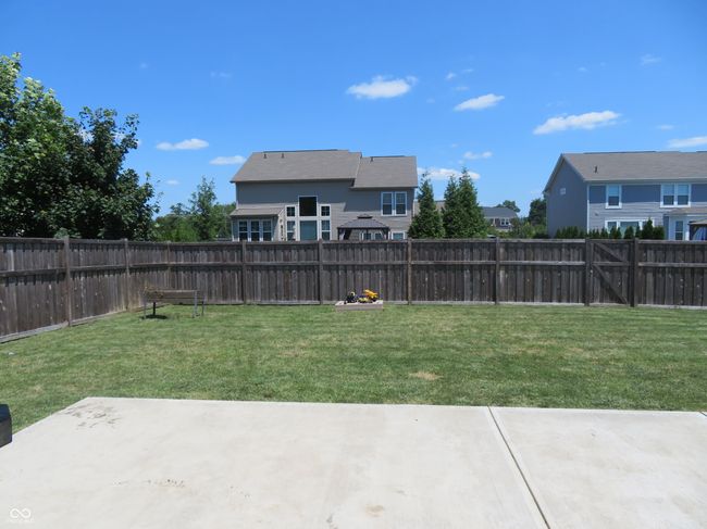 fenced backyard featuring a patio | Image 6