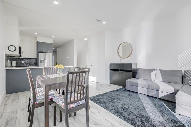 Dining area with light wood-style floors and recessed lighting | Image 20