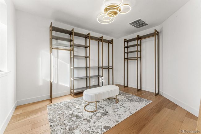 2nd floor loft has been enclosed and converted into a huge walk-in closet or fitness room. | Image 24