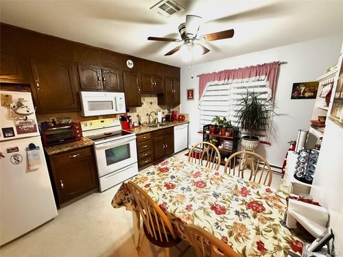 c-418 Weymouth Ct, Ridge, NY, 11961-1525 | Card Image