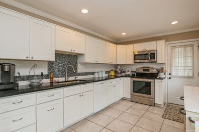 30 James Lane, House other with 4 bedrooms, 1 bathrooms and null parking in Levittown NY | Image 2