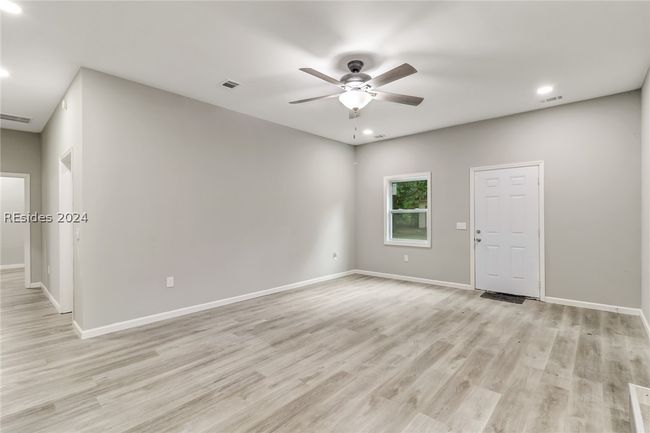 Spare room with light hardwood / wood-style flooring and ceiling fan | Image 20