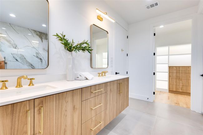Bathroom featuring vanity | Image 26