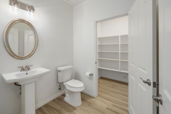 Half Bath with Storage Closet and Shelving | Image 7