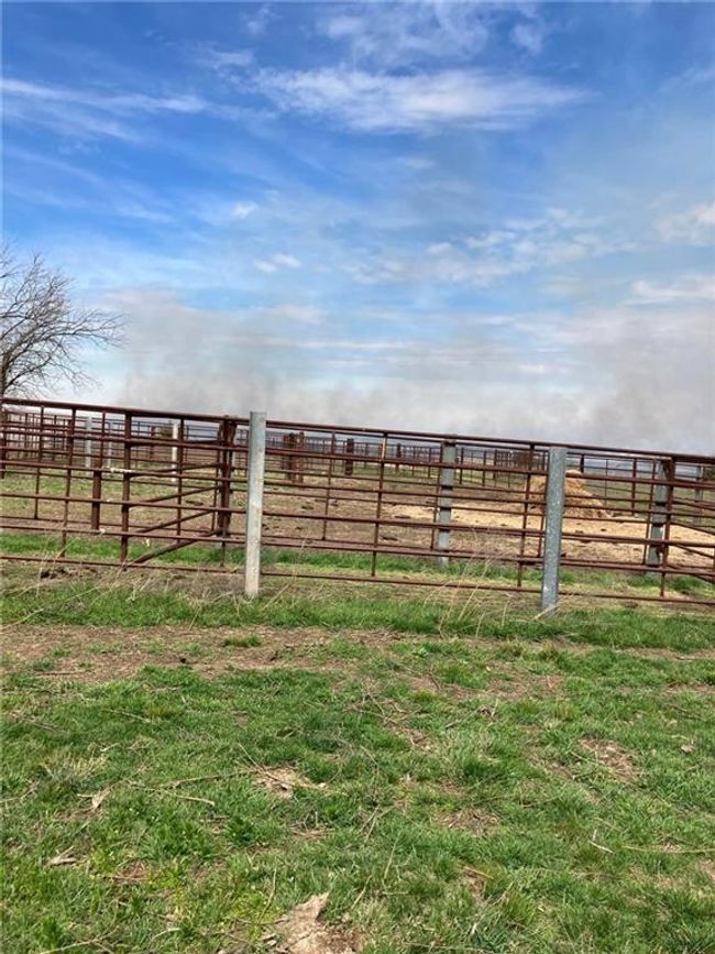View of yard featuring fence and a rural view | Image 8