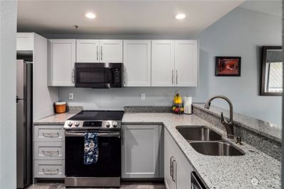 New stainless GE appliances, recessed stainless double sink | Image 2