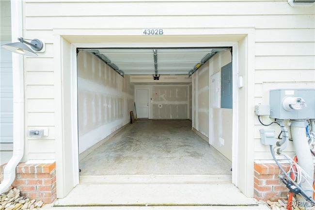 Garage with electric panel | Image 46