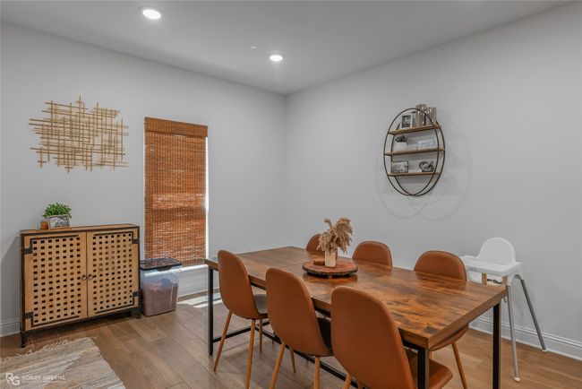 Dining room with recessed lighting, baseboards, and wood finished floors | Image 11