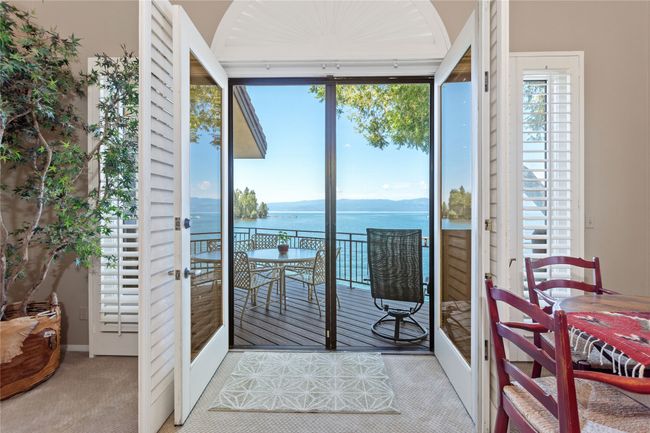 Doorway to outside with a water view, french doors | Image 11