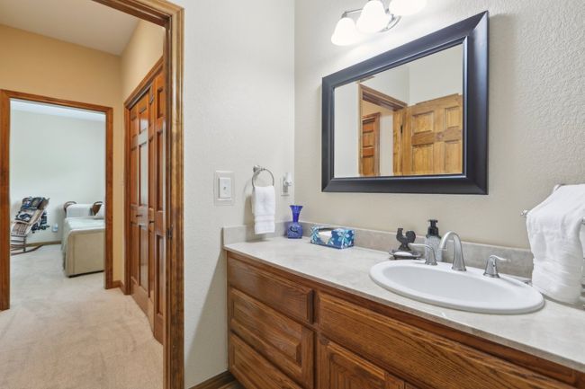 Bathroom featuring baseboards and vanity | Image 15