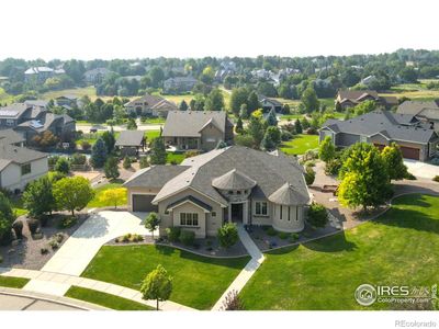 This impeccable custom ranch is sure to please with its perfect blend of elegant architectural features and timeless design. | Image 2