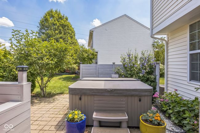 view of patio / terrace with a hot tub | Image 32