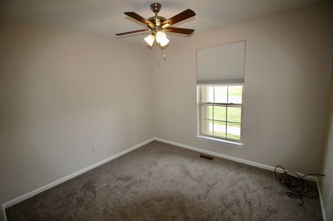 2nd bedroom also has new carpet and ceiling fan! | Image 16