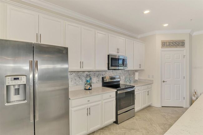 UNIT-201 - 12590 Ghiberti Cir, Condo with 3 bedrooms, 2 bathrooms and null parking in VENICE FL | Image 23