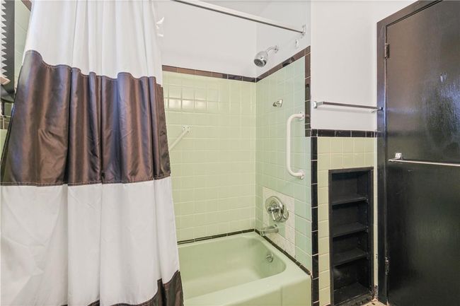 Bathroom featuring shower / tub combo | Image 22