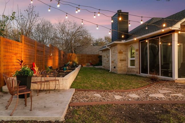 The garden bed invites you to get creative and cultivate your own outdoor haven, whether you're adding new plants or simply enjoying the beauty of what’s already there | Image 30