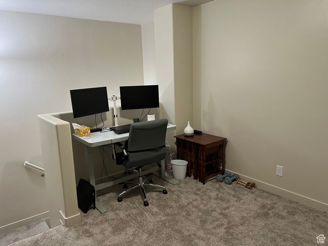 Home office featuring baseboards and carpet | Image 16