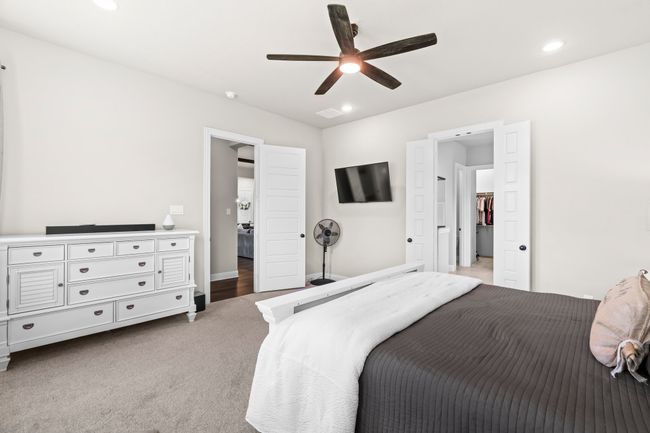 Bedroom featuring recessed lighting, carpet floors, and a ceiling fan | Image 21