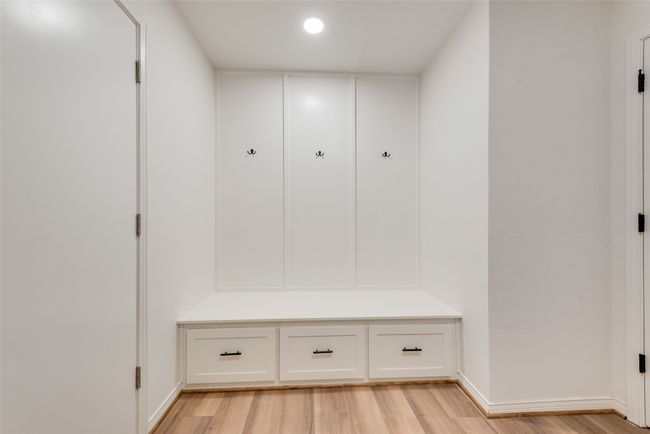 Mudroom & Utility featuring light wood-style flooring | Image 15