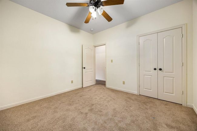 Another secondary bedroom with new carpet and upgraded fixtures. | Image 21