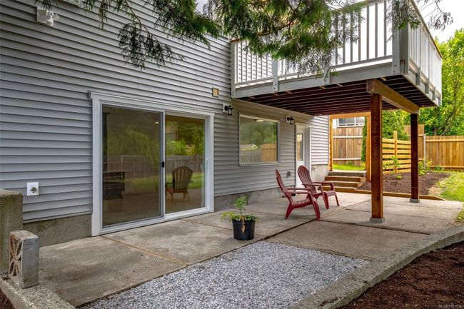 Covered entrance to Downstairs and patio area | Image 64