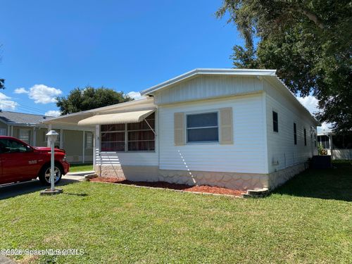 703 Lark Dr, Barefoot Bay, FL, 32976-7223 | Card Image
