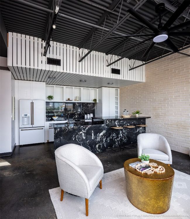 kitchen open to living area | Image 5