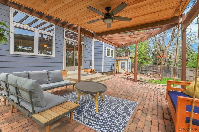 COVERED BRICK PATIO WITH CEILING FAN/LIGHT | Image 36