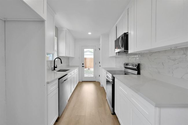 5015 Monteith Dr, House other with 3 bedrooms, 2 bathrooms and 2 parking in Spring TX | Image 10