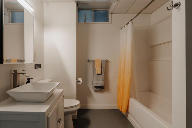 Full bathroom featuring vanity, toilet, and shower / bath combo | Image 28