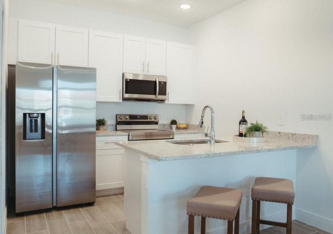 1586 Cumin Dr, House other with 2 bedrooms, 2 bathrooms and null parking in POINCIANA FL | Image 4
