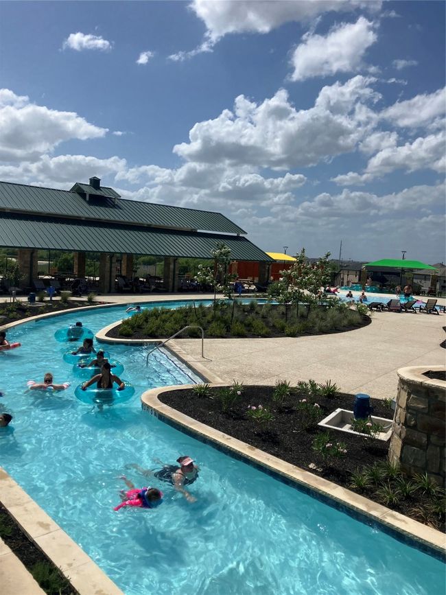 Community pool with a patio area | Image 31