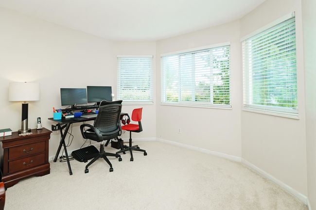 Carpeted home office with baseboards | Image 25